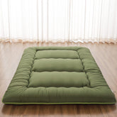 Zelladorra Japanese floor mattress in its storage bag for easy transport