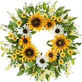 Zjlmit spring wreath with sunflowers and daisies brightens entry.