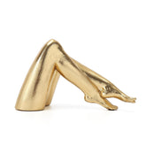 Zonsuli Golden Legs sculpture with a gold finish adds elegant focal point to any room.