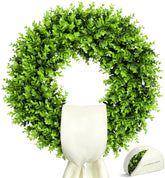 Zyekqrue 23-inch boxwood wreath with sash on front door showing year-round greenery.
