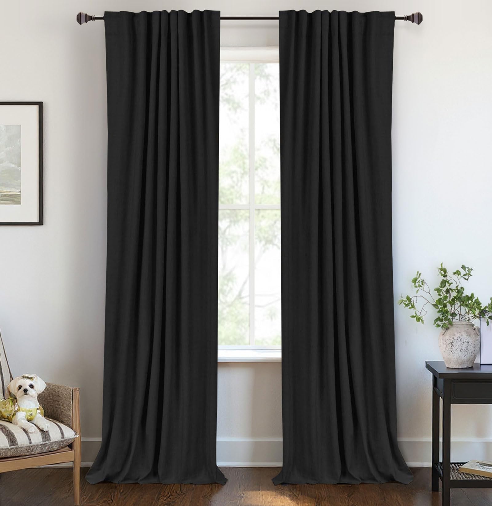 100% Blackout Shield linen curtains in a dark bedroom offer total light control.