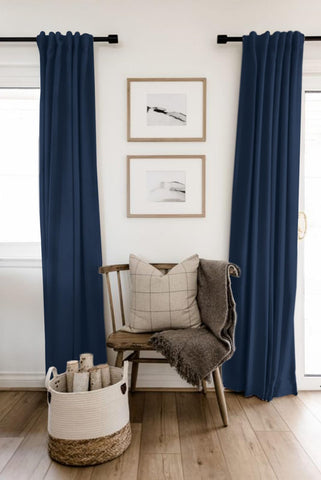 Living room setup with 100% Blackout Shield linen curtains in midnight blue