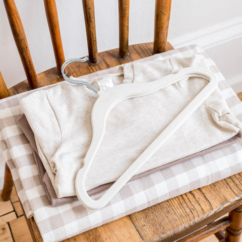 3 Sprouts Velvet Baby Hangers 360 swivel for easy access.