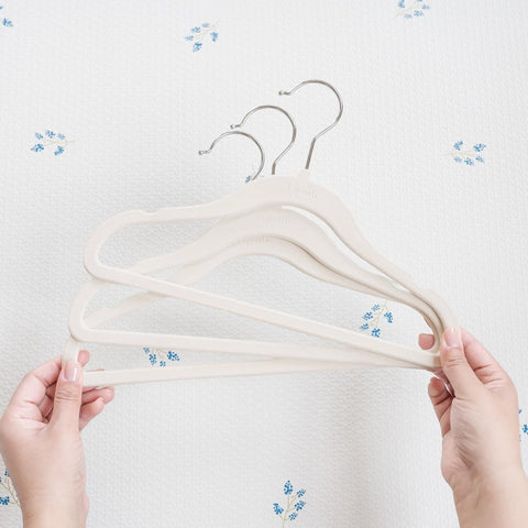 3 Sprouts Velvet Baby Hangers suitable for newborn to toddler outfits.