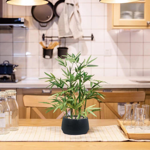 365 Blooming Decor artificial bamboo with black pot complements modern décor as a centerpiece