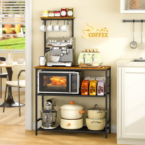 3IngSeagulls bakers rack with microwave on shelf keeps counters clear.