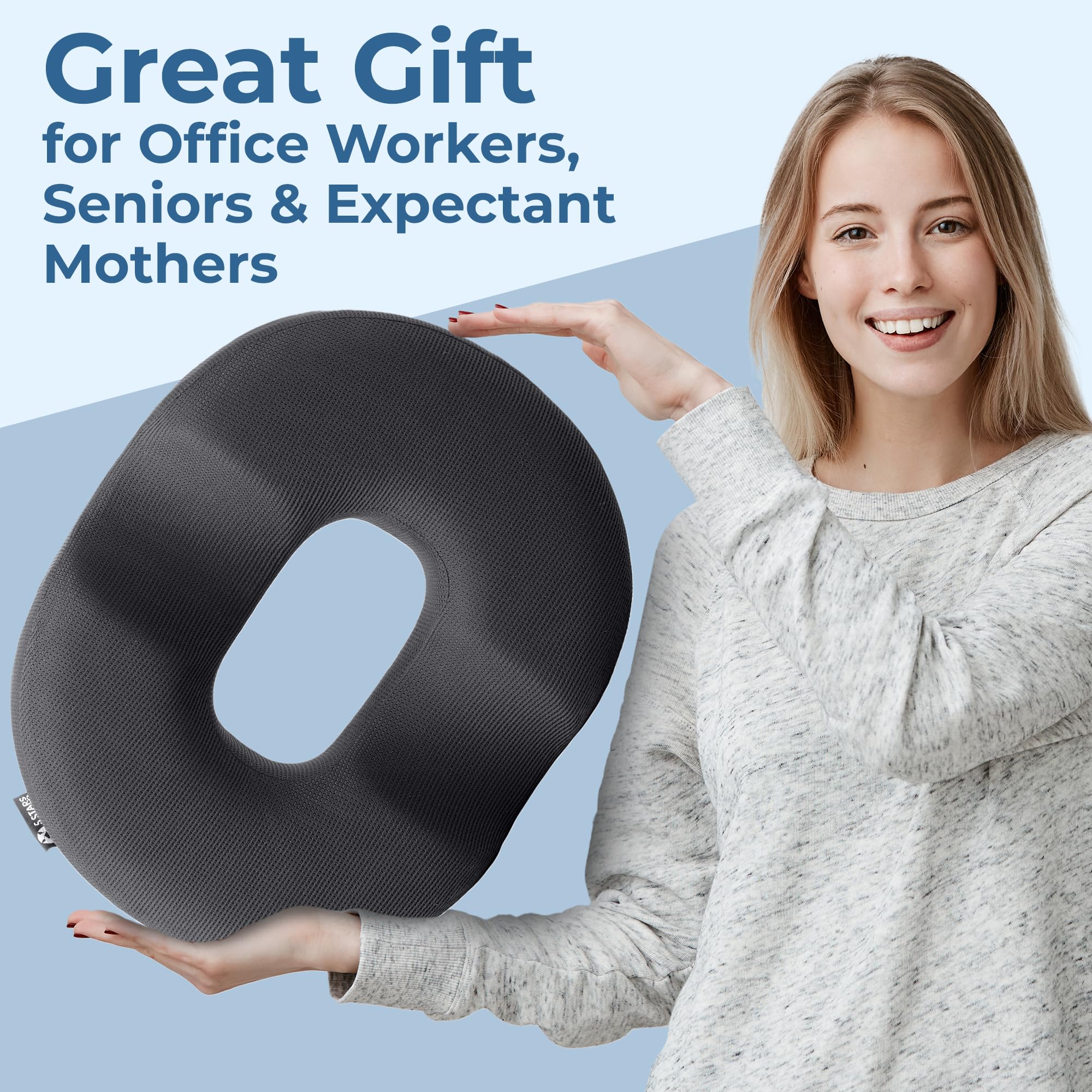 Dark gray color of the 5 Stars United Donut Pillow blends with any workspace.