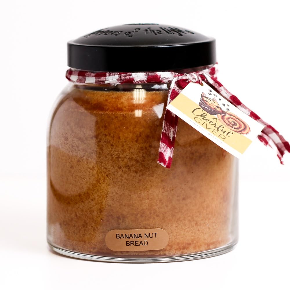 A Cheerful Giver banana nut bread candle jar with lid boosts cozy ambiance.