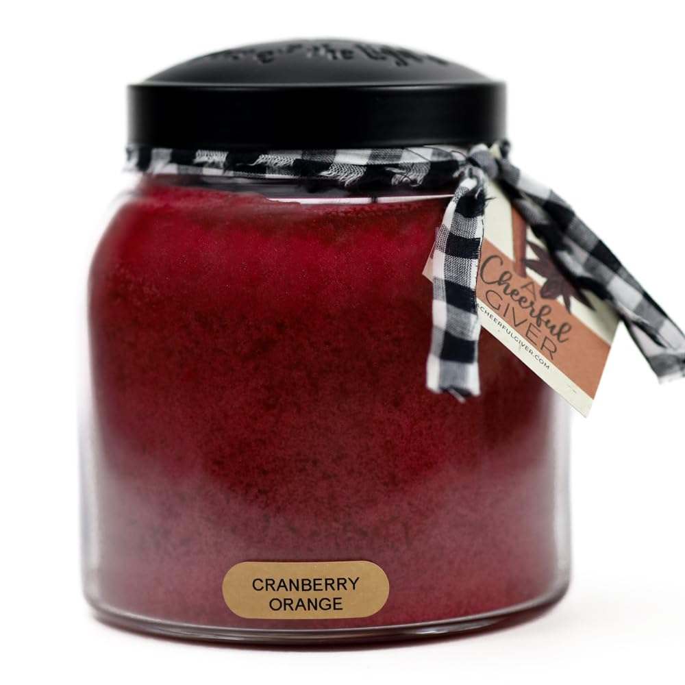 A Cheerful Giver Cranberry Orange 34oz candle, front view, creates cozy ambiance