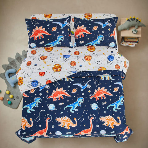 A Nice Night glow dino pillowcase matching the comforter for coordinated nights