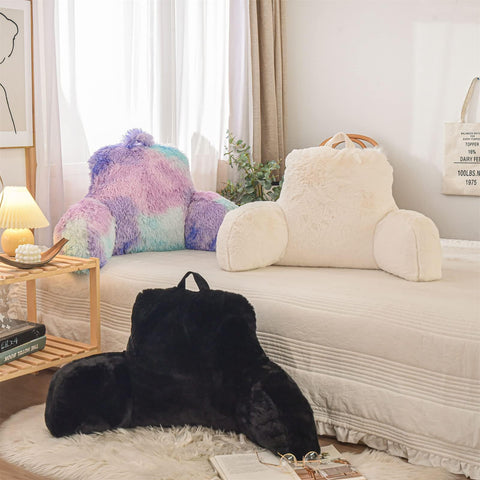 A Nice Night portable reading pillow with handle for easy transport.