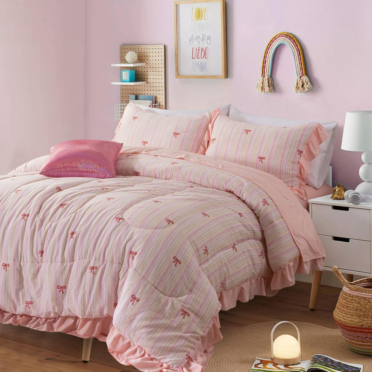 A Nice Night rainbow stripes bows twin bedding set on bed showing vibrant colors