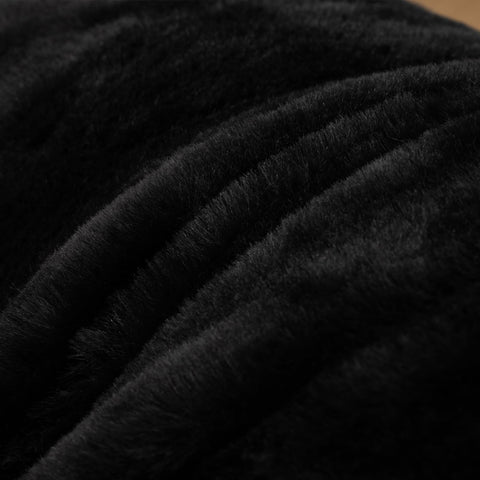 A Nice Night reading pillow on couch for comfortable bedrest.