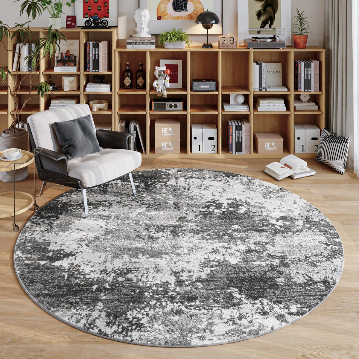 Acapet round 4ft grey rug with anti-slip backing for stable placement.
