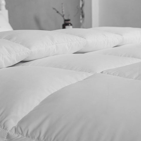 ACCURATEX duvet insert shown on a bed for a full, cozy king fit.