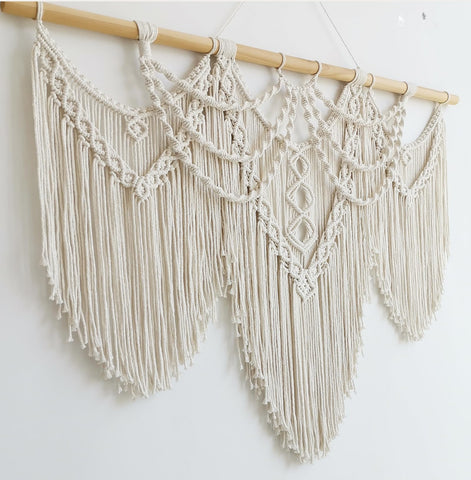 Achart macrame three-piece assembly offers flexible hanging options