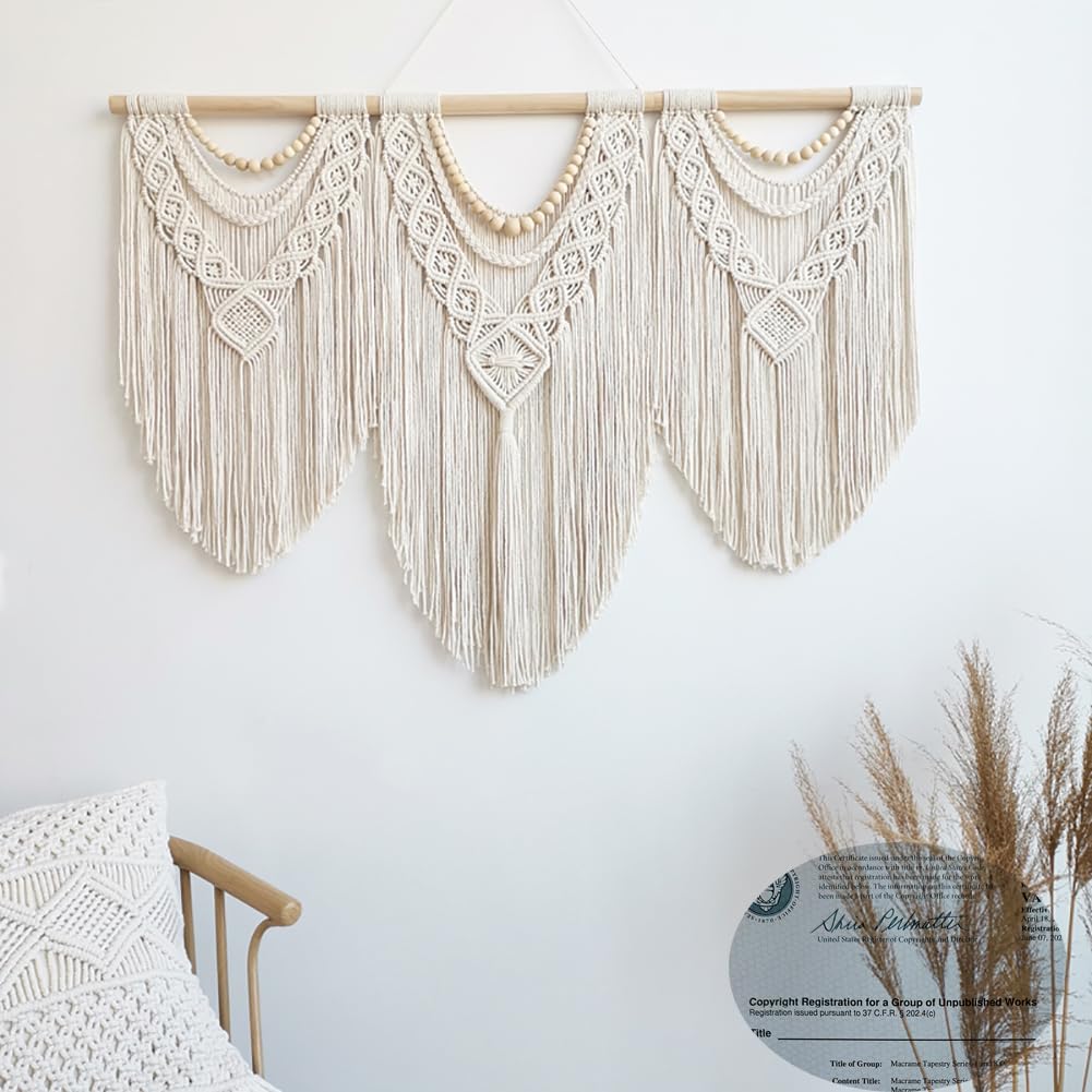 Achart boho wall hanging placed above a sofa creates a focal point