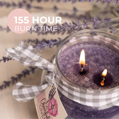 A Cheerful Giver double-wick candle delivers cleaner burn and stronger scent.