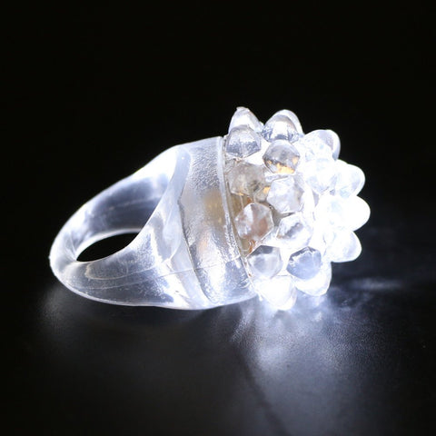 Acmee rave party ring set on display highlighting bold white light for nighttime events.