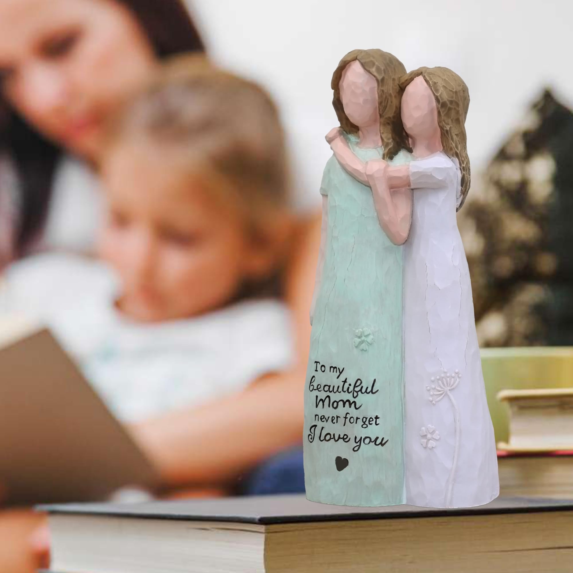 AcowSpt figure with heads leaning together shows a close bond.