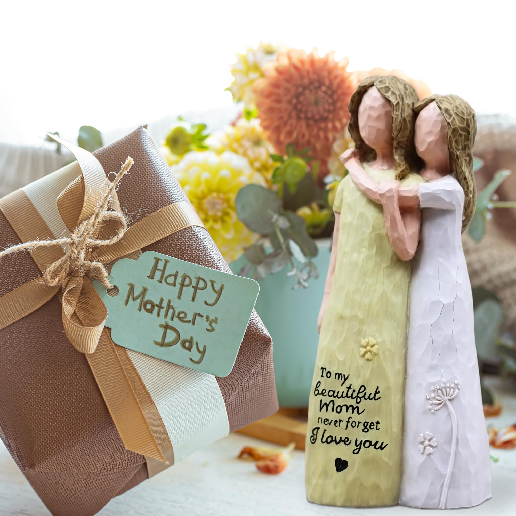 AcowSpt mother-daughter-bond-figurine-yellow highlights a deep connection in a home display.