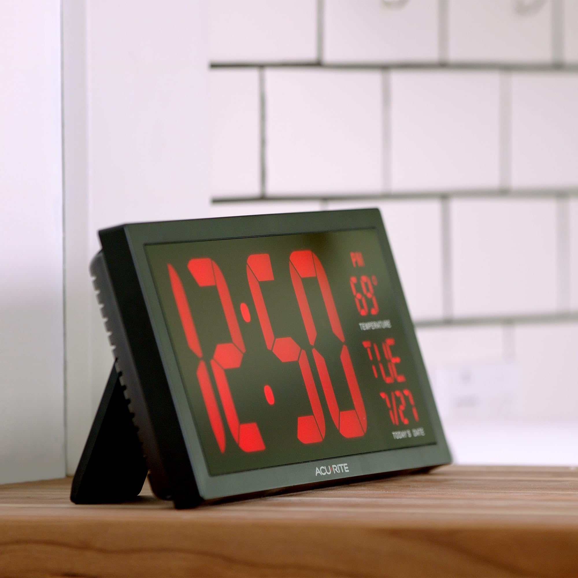 AcuRite clock displaying time, date, and indoor temperature for daily awareness