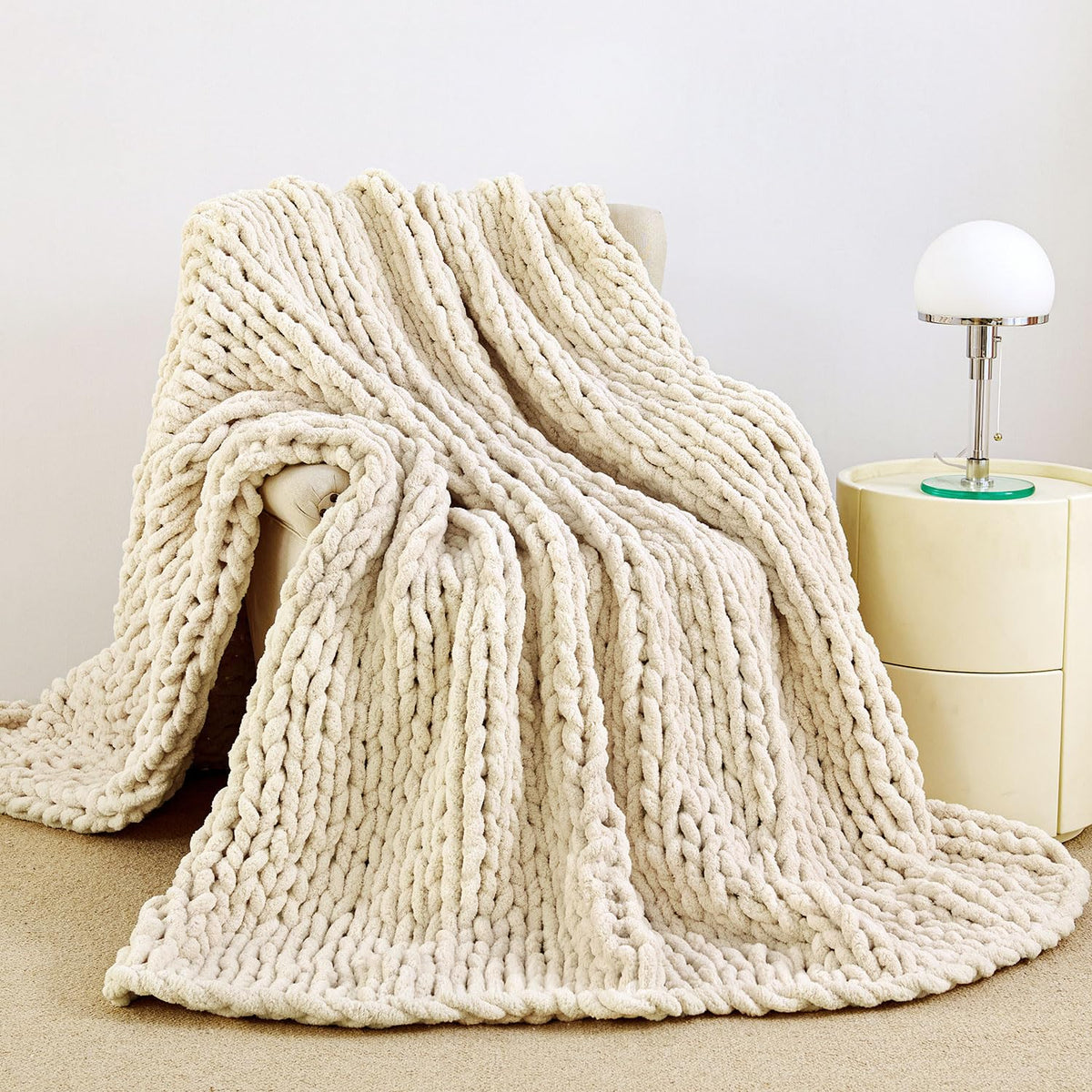 Admitrack chunky-knit blanket closeup in ivory reveals soft chenille texture.