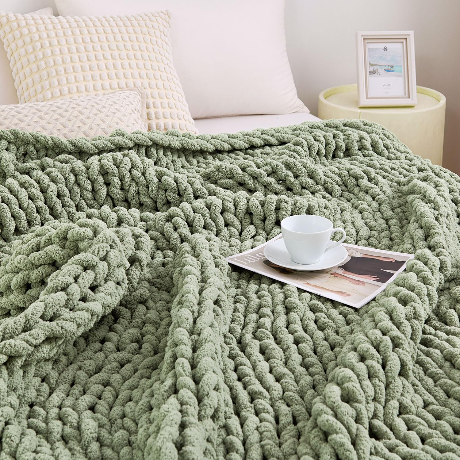 Admitrack chunky-knit blanket on a sofa adds cozy texture to the living room.