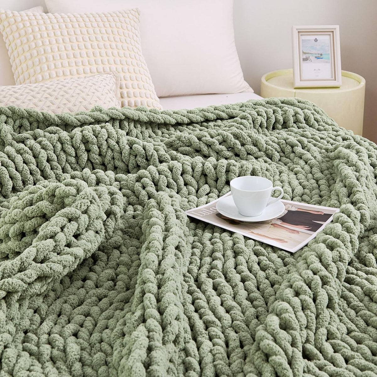 Admitrack chunky-knit blanket on a sofa adds cozy texture to the living room.