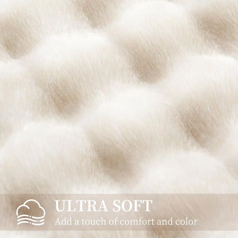 Admitrack decorative cream blanket complements sofas and beds.