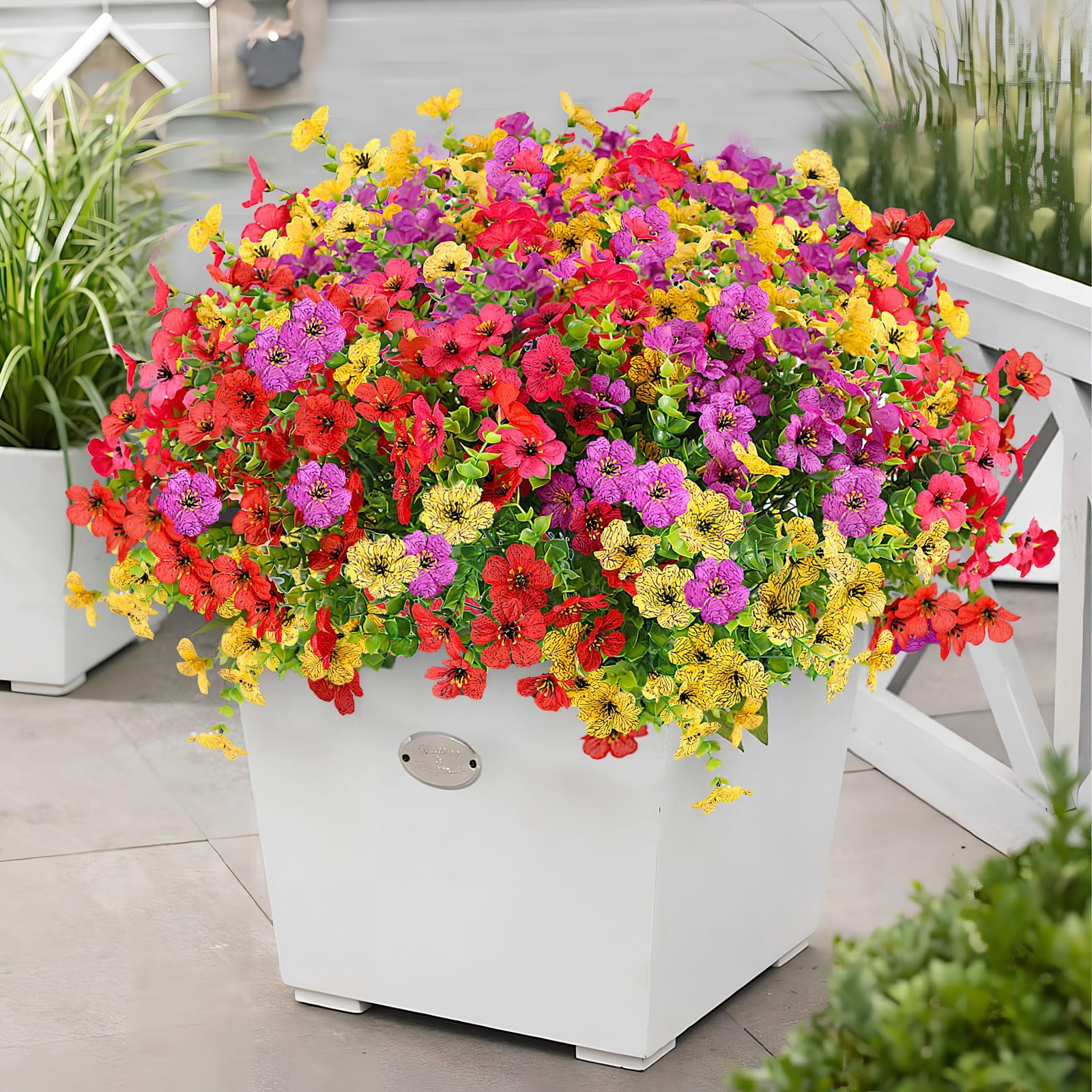 ADXORA yellow artificial flowers brighten sunlit planters and window boxes.