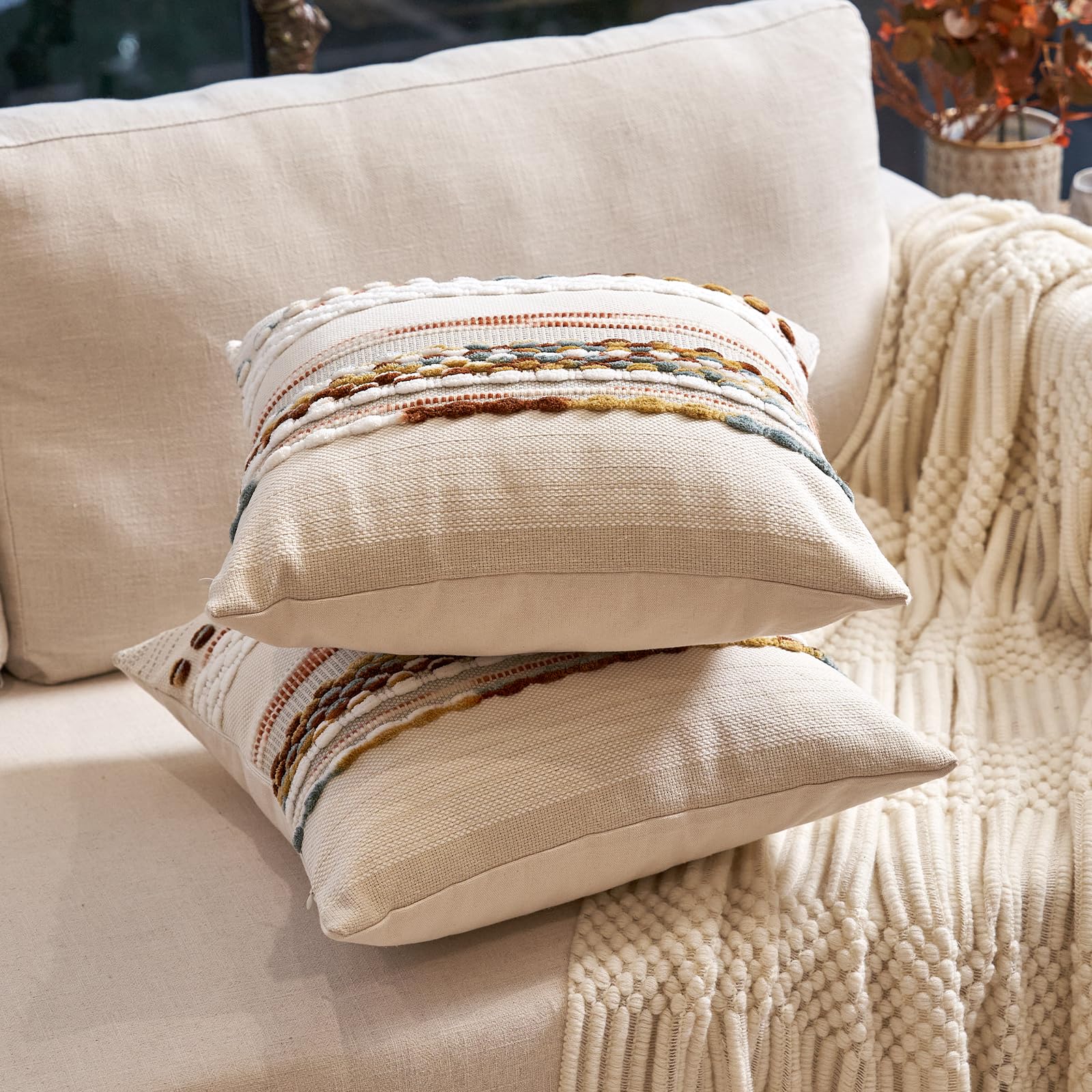 Aeckself 18x18 pillow cover two-pack provides versatile neutral accent for bed.