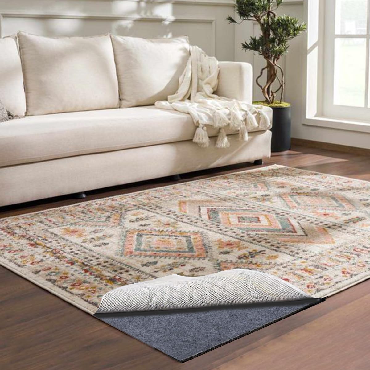 AEHISDHIE rug pad helps keep fixed rugs in place on most floors.