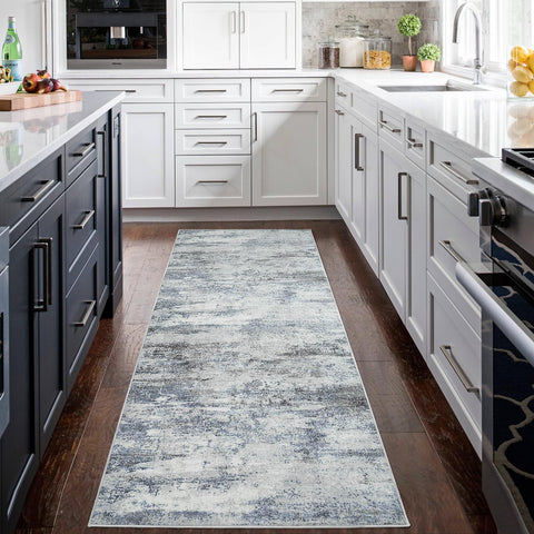 Non-slip rubber backing helps prevent sliding on wood or tile floors.