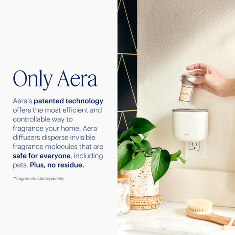 AERA Mini plugged into wall outlet for continuous scenting.