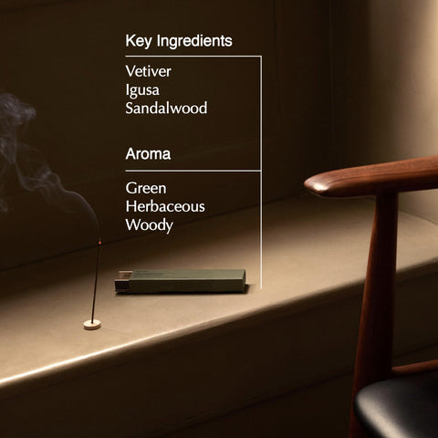Close-up of Aesop Kagerou incense sticks releasing smoky sandalwood notes.