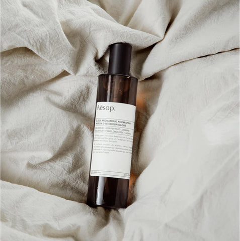 Aesop Olous Aromatique citrus-cedar-cardamom blend enriching rooms