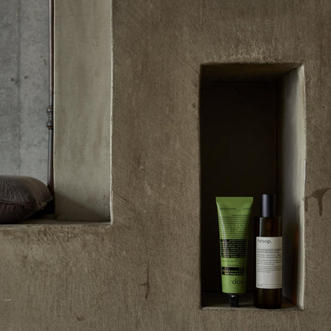 Aesop Olous Aromatique woody citrus notes create inviting home fragrance