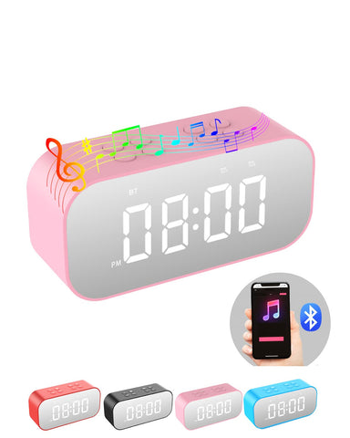 AFK alarm clock with Bluetooth speaker beside bed and mirror LED display for easy night viewing