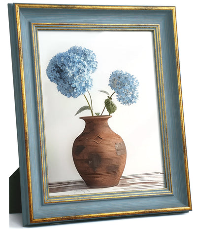 Afuly blue and gold 8x10 vintage frame on wall, enhances heirloom photos
