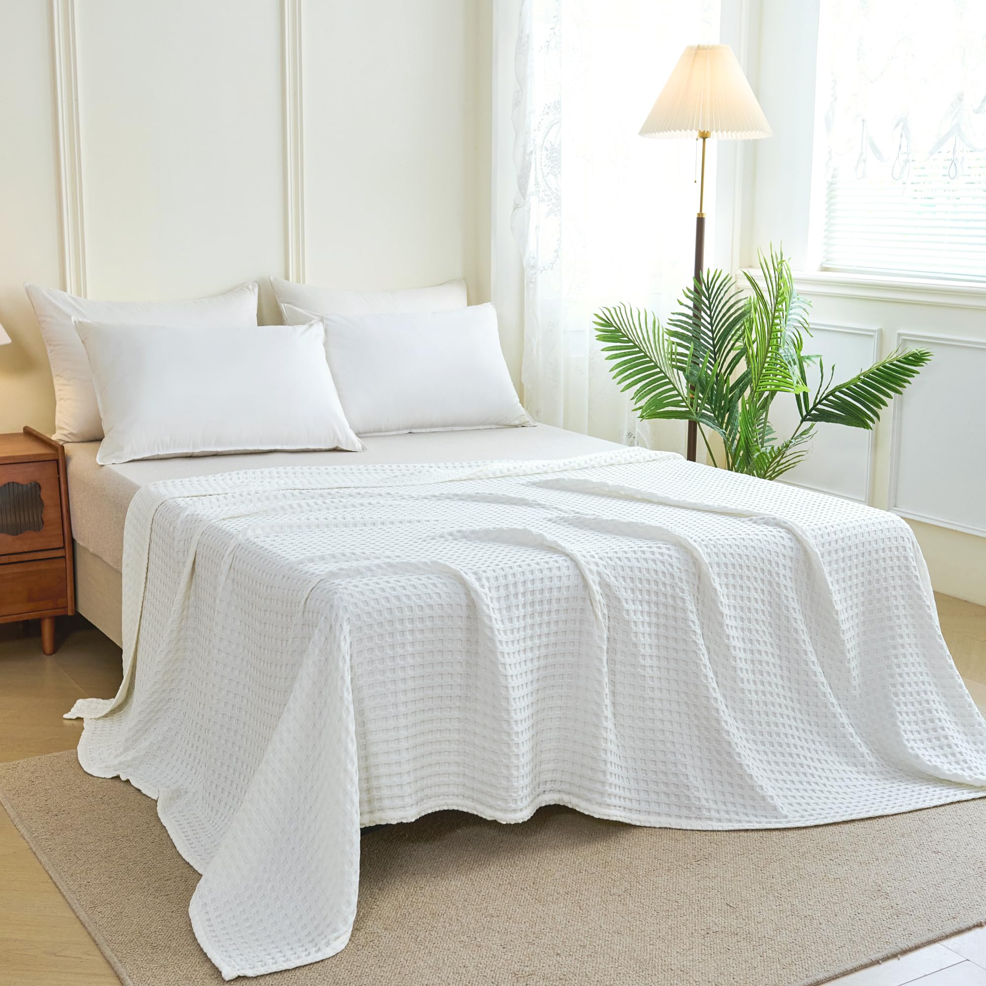 Aganear cooling waffle blanket on a queen bed, highlighting breathable texture for restful sleep