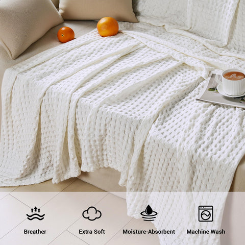 Aganear blanket on sofa adds soft, breathable warmth for evenings
