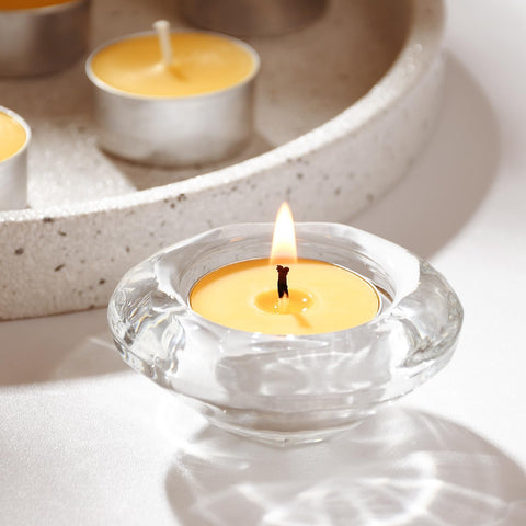 AGLARY tealights offer a calm, warm glow for evenings.