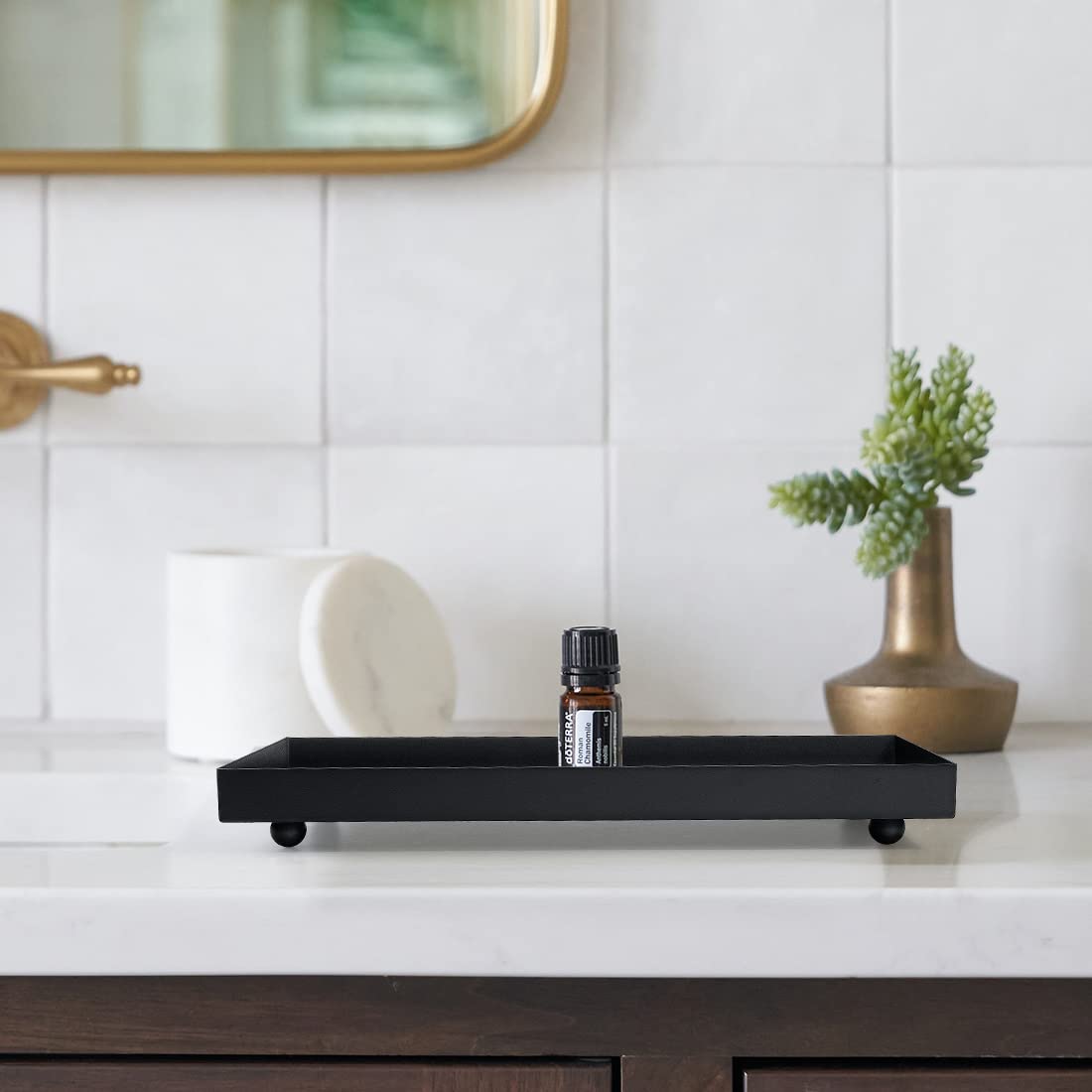 Aglary tray bottom with four stabilizing balls for steady placement.
