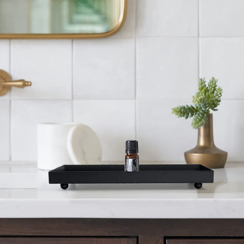 Aglary tray bottom with four stabilizing balls for steady placement.