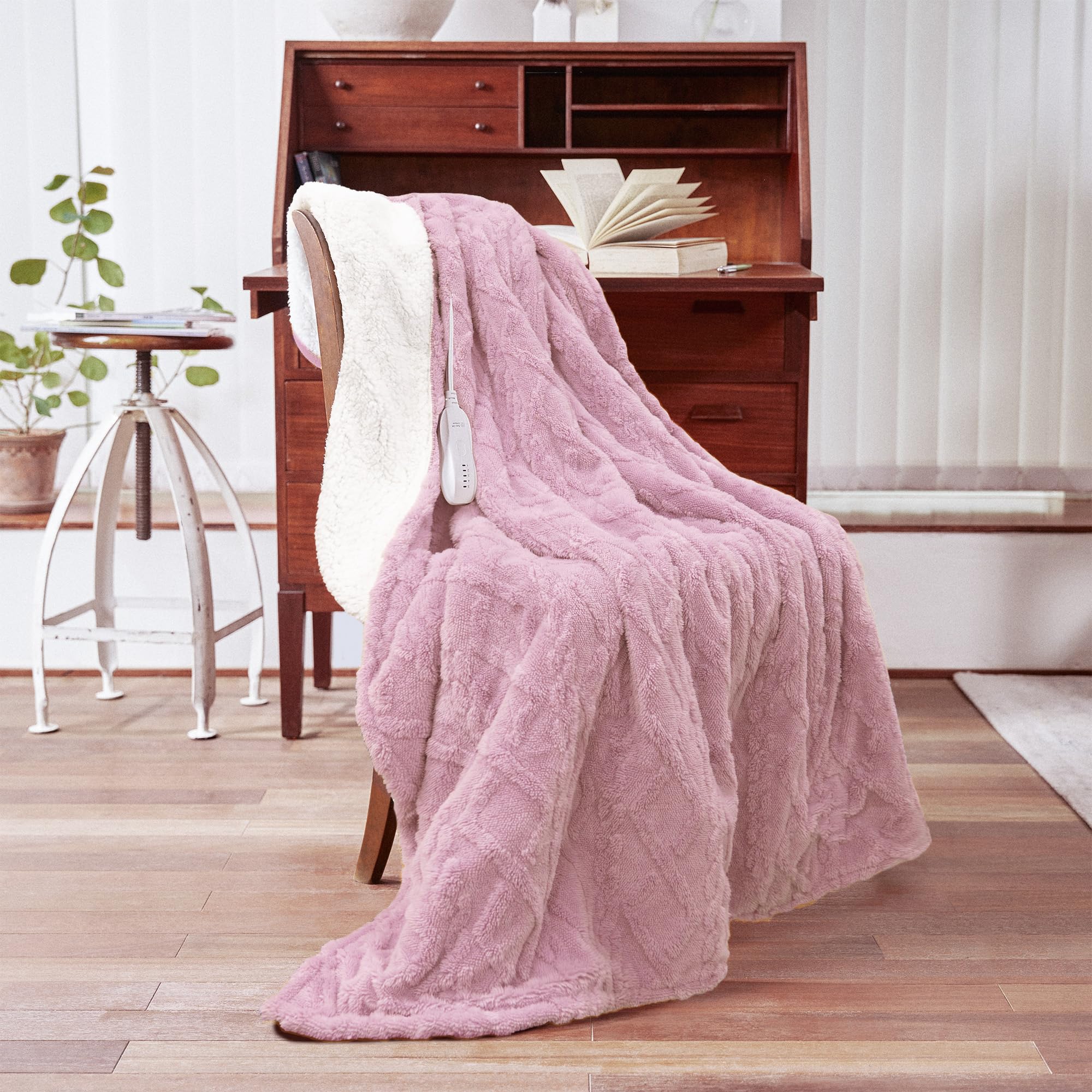 Aheadpret heated blanket pink 50x60 coverage over a couch