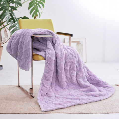 Purple Aheadpret heated blanket folded, ready for a chilly evening.