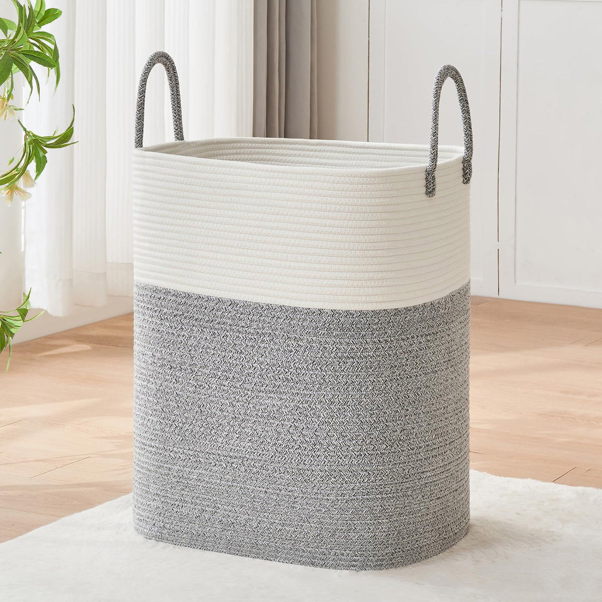 AINUOQI laundry basket with handles highlights large blanket storage.