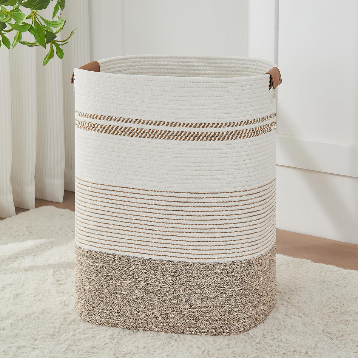 AINUOQI laundry basket with handles shows natural weave for sturdy storage.