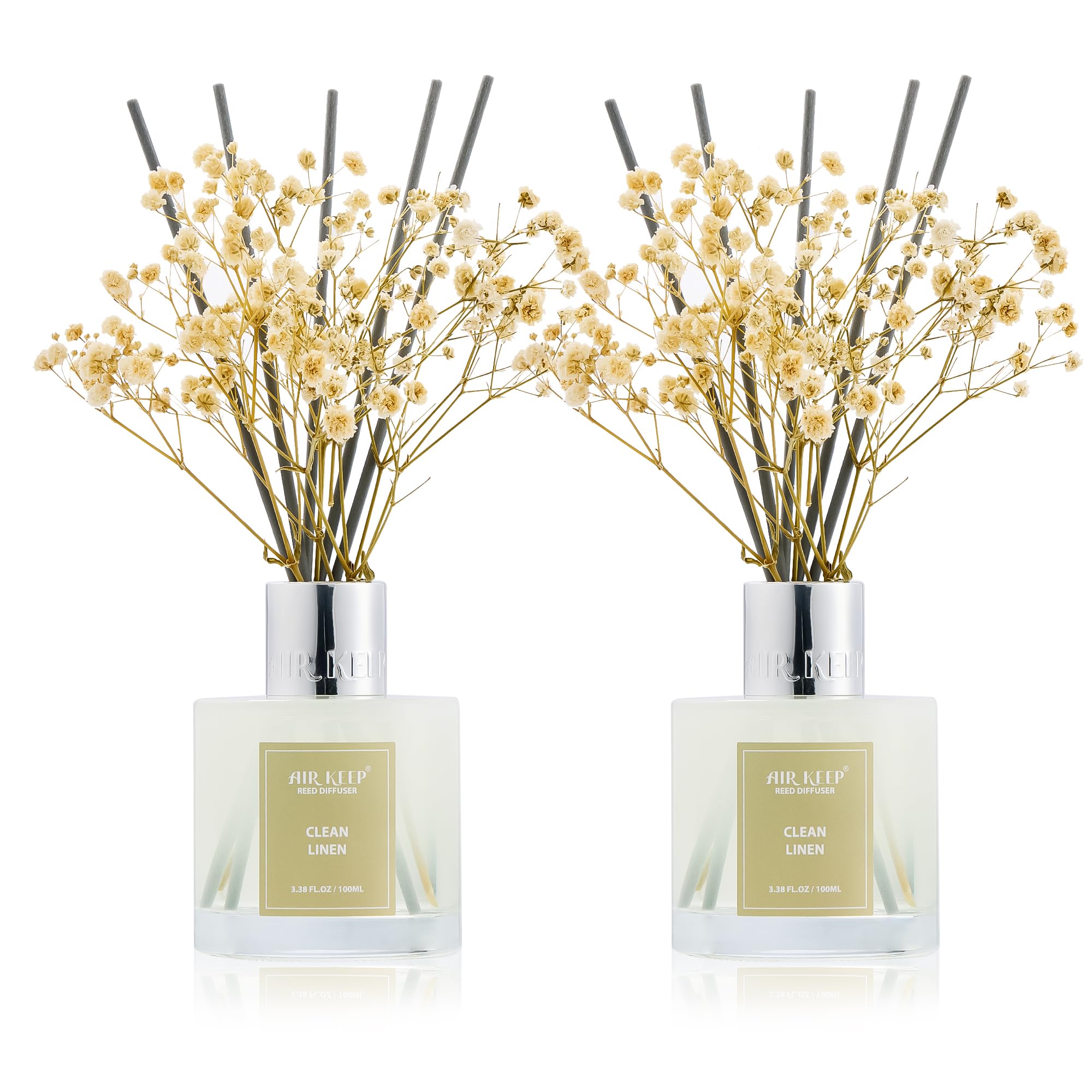 Airkeep Clean Linen reed diffuser bottles brightening a living room ambiance